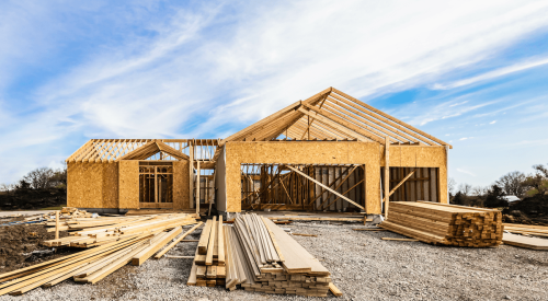 Lumber and building materials on construction site for building a new home