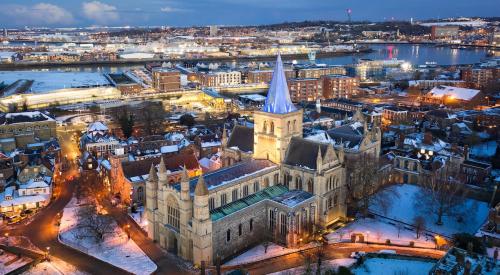 Rochester, NY downtown lit up on snowy winter night