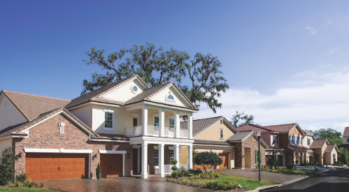 A home exterior in Florida designed by BSB Design that's in an updated Georgian style 