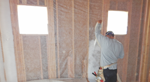 Installing blown-in fiberglass insulation