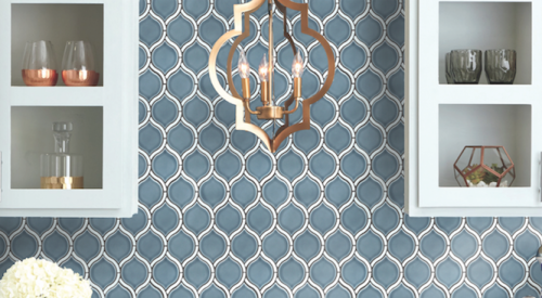 Inspired by Greek mythology, the Divine mosaic series from Emser Tile boasts clean, contemporary arabesque lines and a gloss finish. Dark-toned borders outline light neutrals and blue tiles, while white borders accent warmer blue and green tiles. The tiles are ideal for backsplashes, shower walls, or accent walls. IBS Booth C7237. 