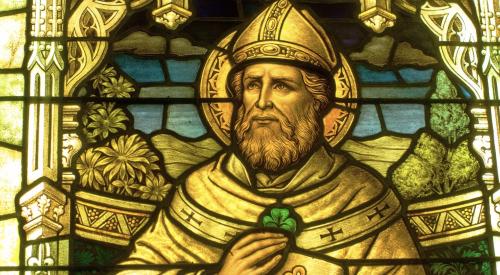 St. Patrick with a shamrock in a stained glass window at the Smith Museum of Stained Glass Windows, Chicago.