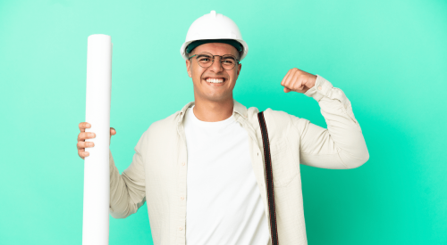 High school student wearing white hard hat explores career in the skilled trades