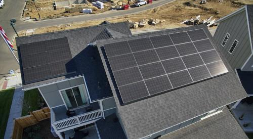 Solar panels on a net zero house roof