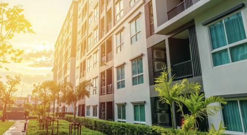 Exterior of city apartment building affordable housing 