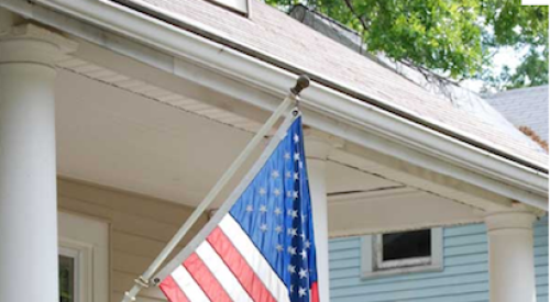 American flag on a home's front porch