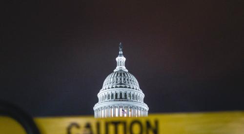 U.S. Capitol with yellow caution tape in front of it