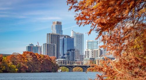 View of Austin, Texas, skyline through autumn leaves