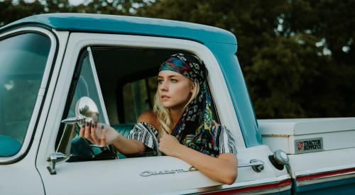 Woman driving a pickup truck