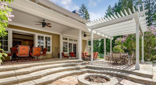 Home backyard with fire pit and gazebo