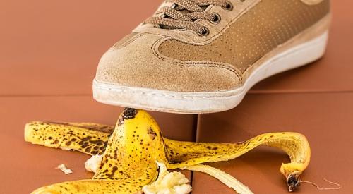 shoe stepping on banana peel and risking a fall