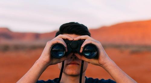 Boy with binoculars