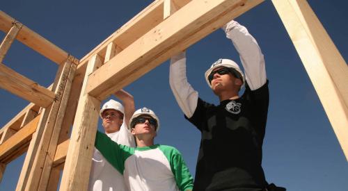 people building a house