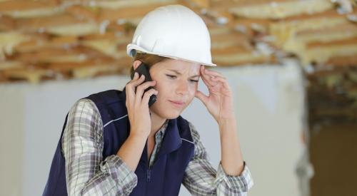 Builder on the phone