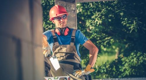 Builder sitting down