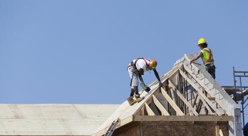 Builders on a roof