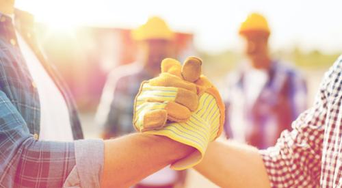 Builders Shaking Hands