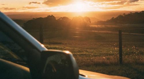 Car with California sunrise