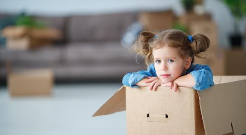 Child in moving box