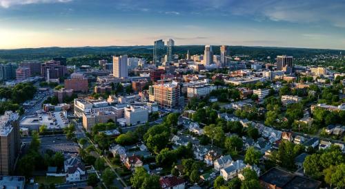 Aerial view of a city and a surrounding suburb