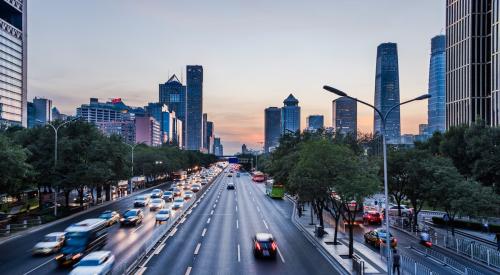 Traffic leaving city at sunset