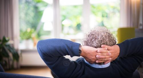 Man on sofa in home