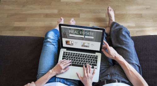 couple looking at homes online