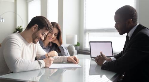 Couple Signing Mortgage Contract