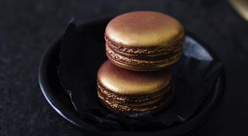 Gilt macaroons and spoon