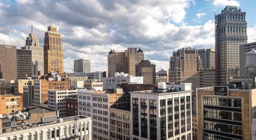 Detroit skyline and apartment buildings on a sunny day