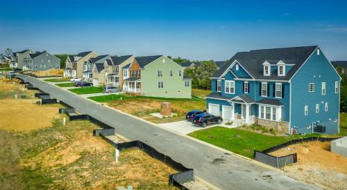 Newly developed neighborhood with blue and green homes