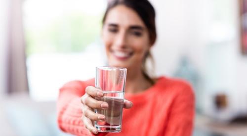 Drinking water in a glass