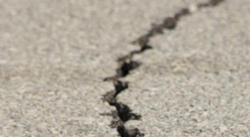 Earthquake-crack-in-pavement