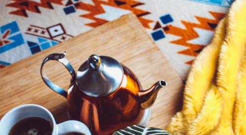 Tea and mug with houseplant