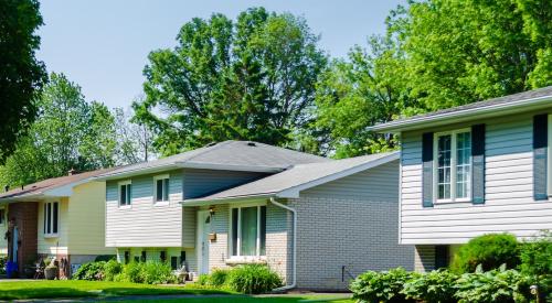 Small entry level houses in leafy green neighborhood