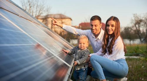 Family with solar panels on their home