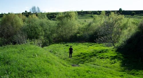 Man_standing_in_field