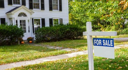 for sale sign outside of house