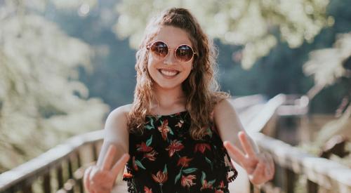 Young woman on a bridge