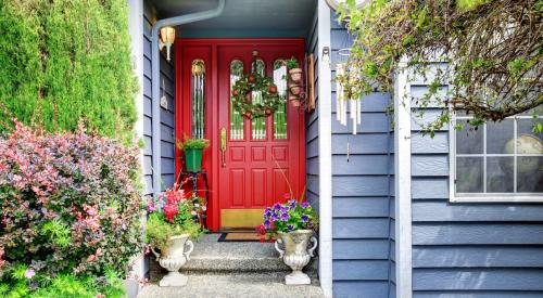 Blue house with red front door