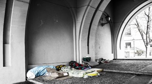 Blankets_and_belongings_on_pavement