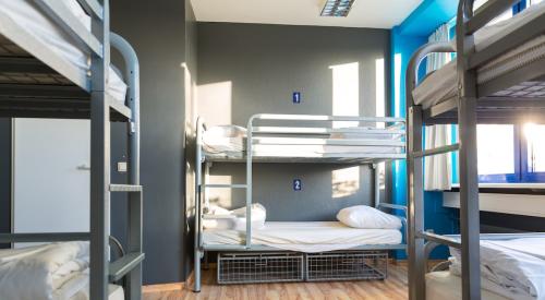 Hostel-style sleeping arrangement in homeless shelter