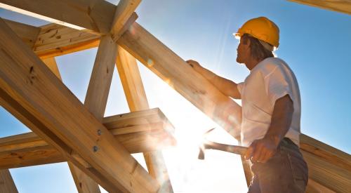 Contractor on roof frame