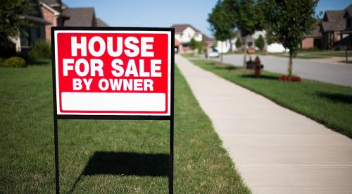 House for sale sign on yard