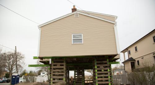 House being lifted