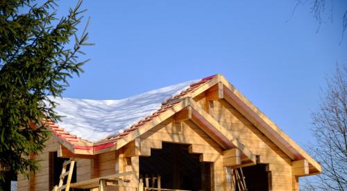 House under construction in winter