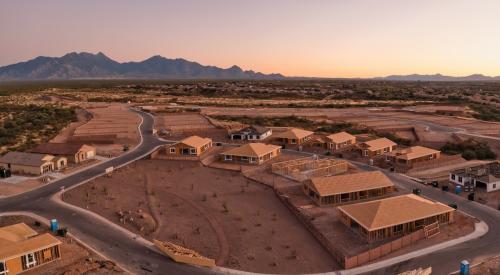 Aerial view of Arizona houses under construction in suburban subdivision