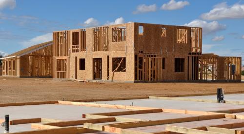 House under construction with most of the wall framing completed