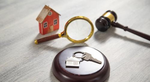 House and house keys next to gavel as U.S. government offers guidance for renters