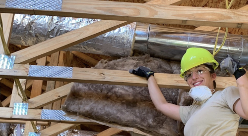 installing HVAC ducts inside house in rafters